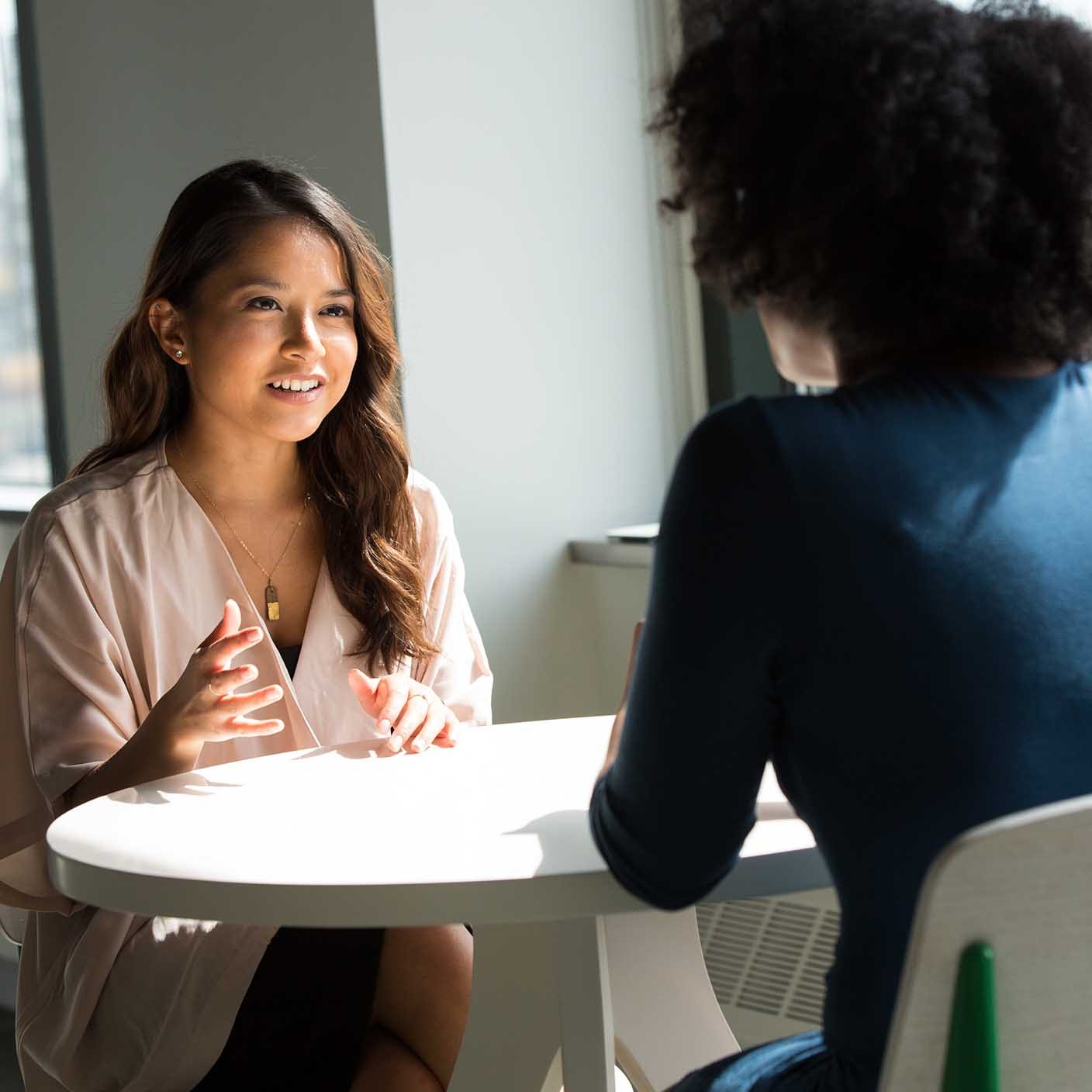 two women having a conversation