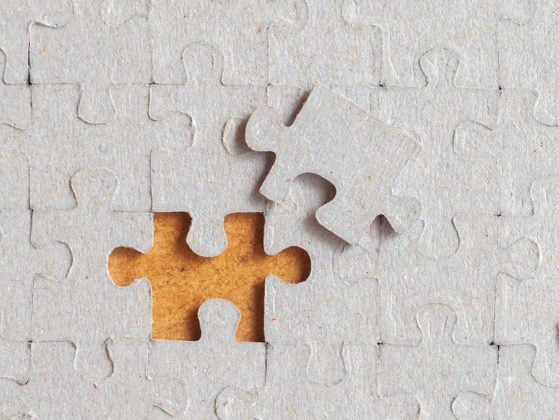 A puzzle with a missing piece